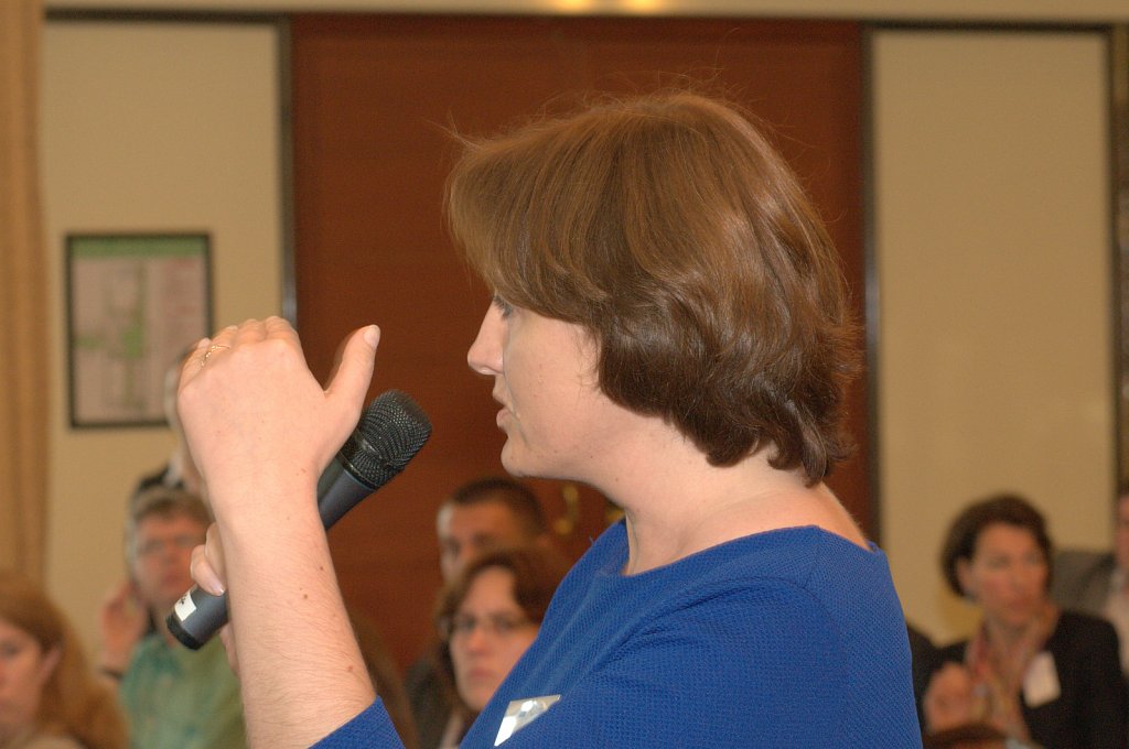 Participant asking a question to the panel