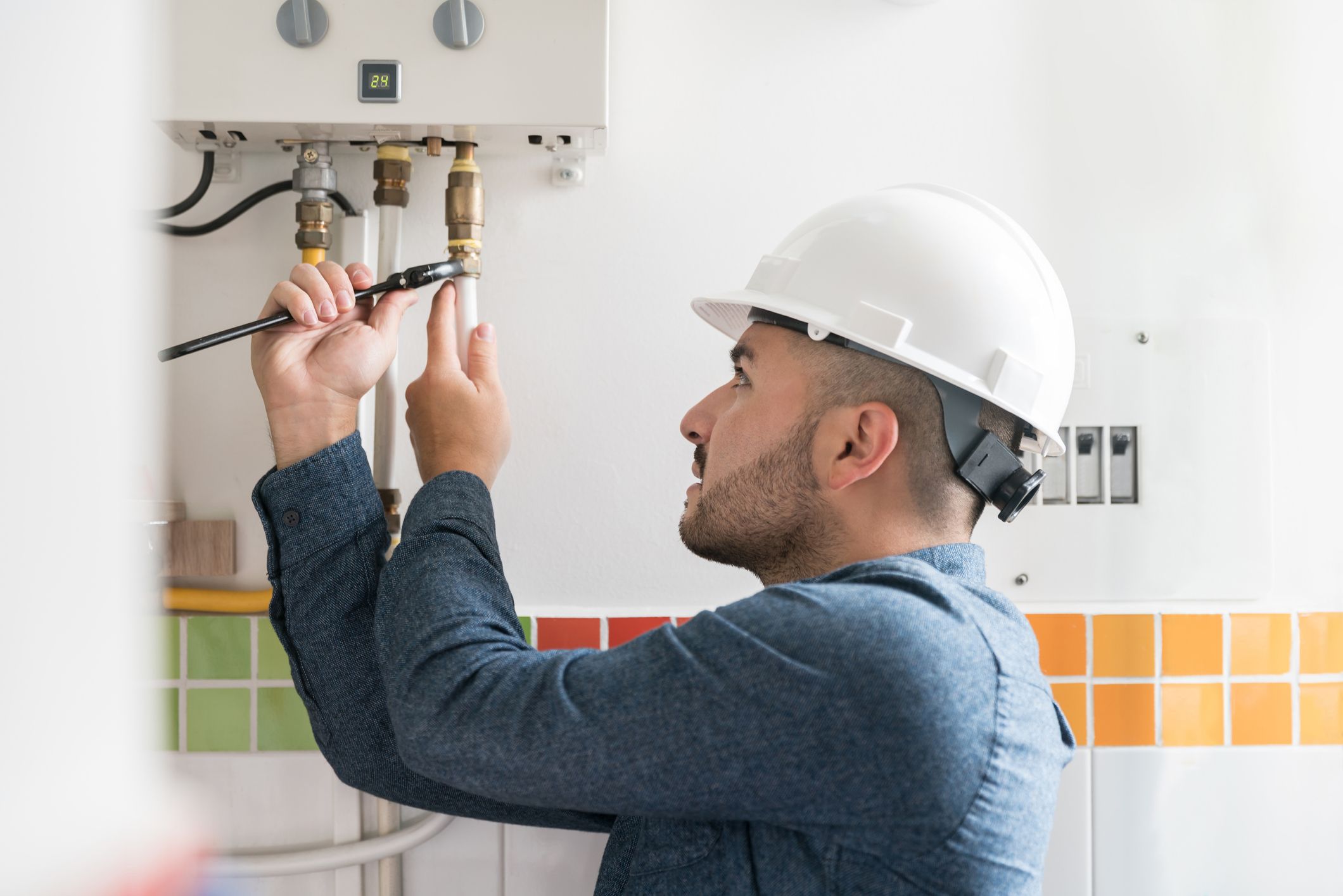 Technitian repairs boiler Technitian repairs boiler