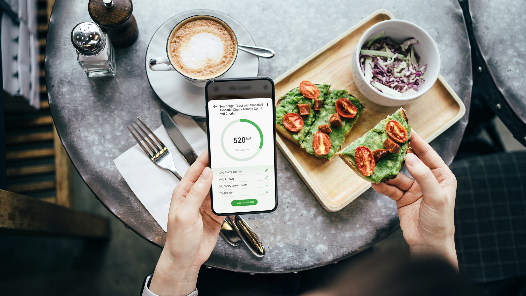 Woman using a diet coaching app on her phone Woman using a diet coaching app on her phone