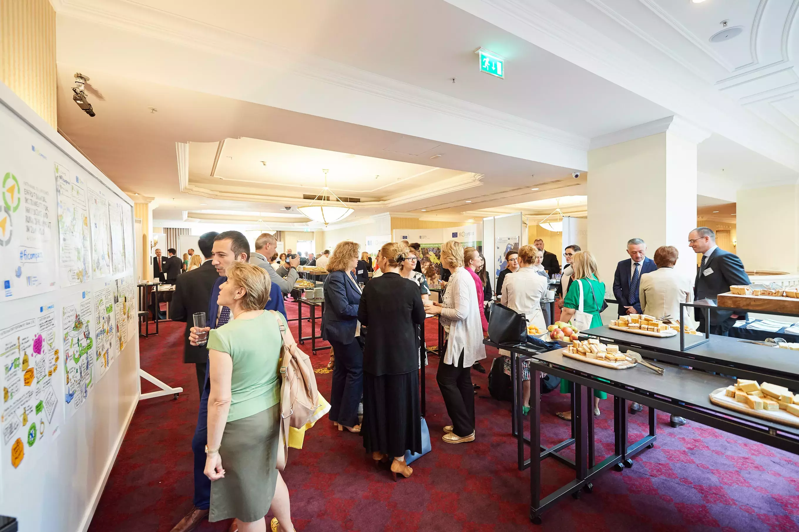 Event participants having a look at illustrations