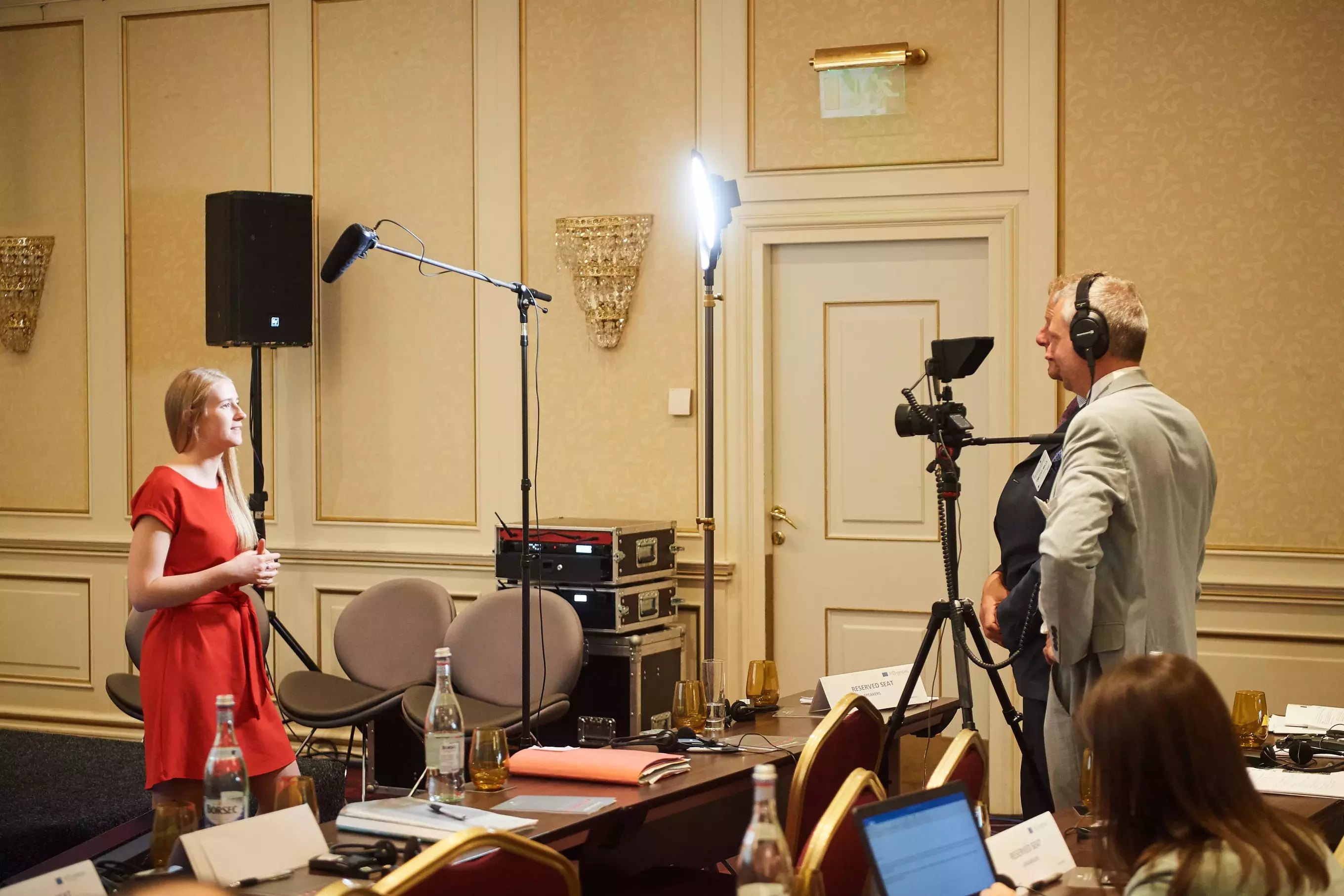 Event participant giving a video testimonial