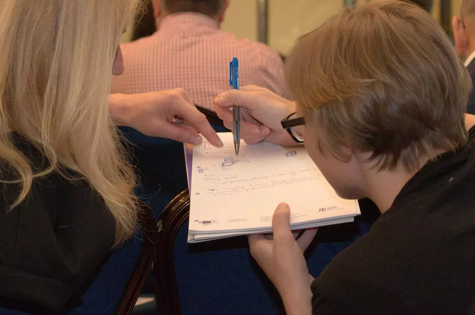 Event participants discussing new ideas