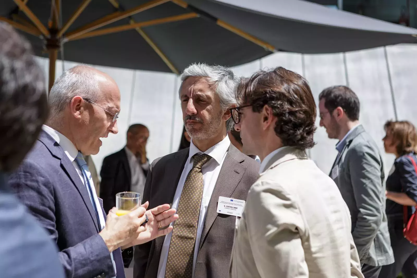 Event participants and Guido Castellano