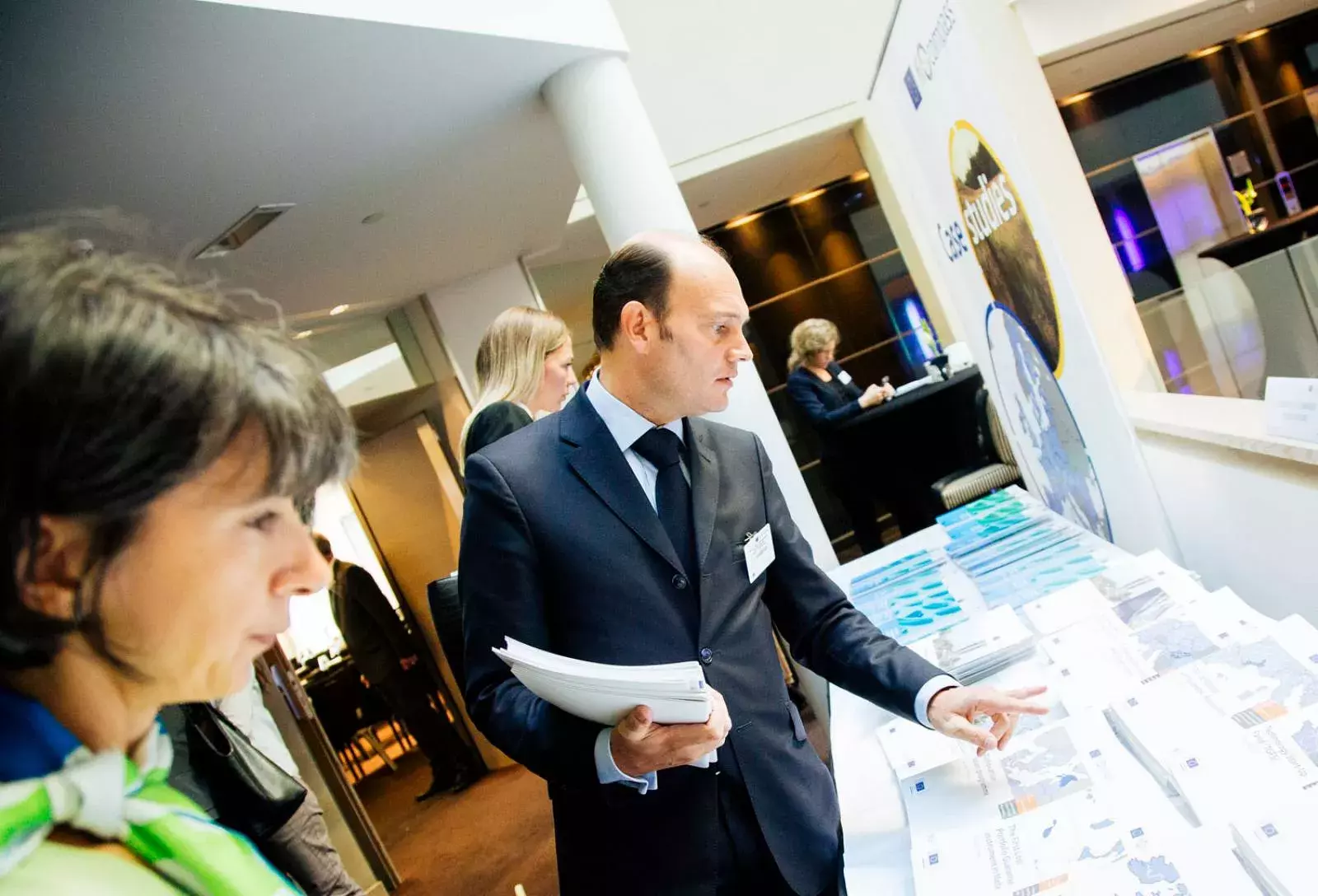 Event participants selecting fi-compass publications