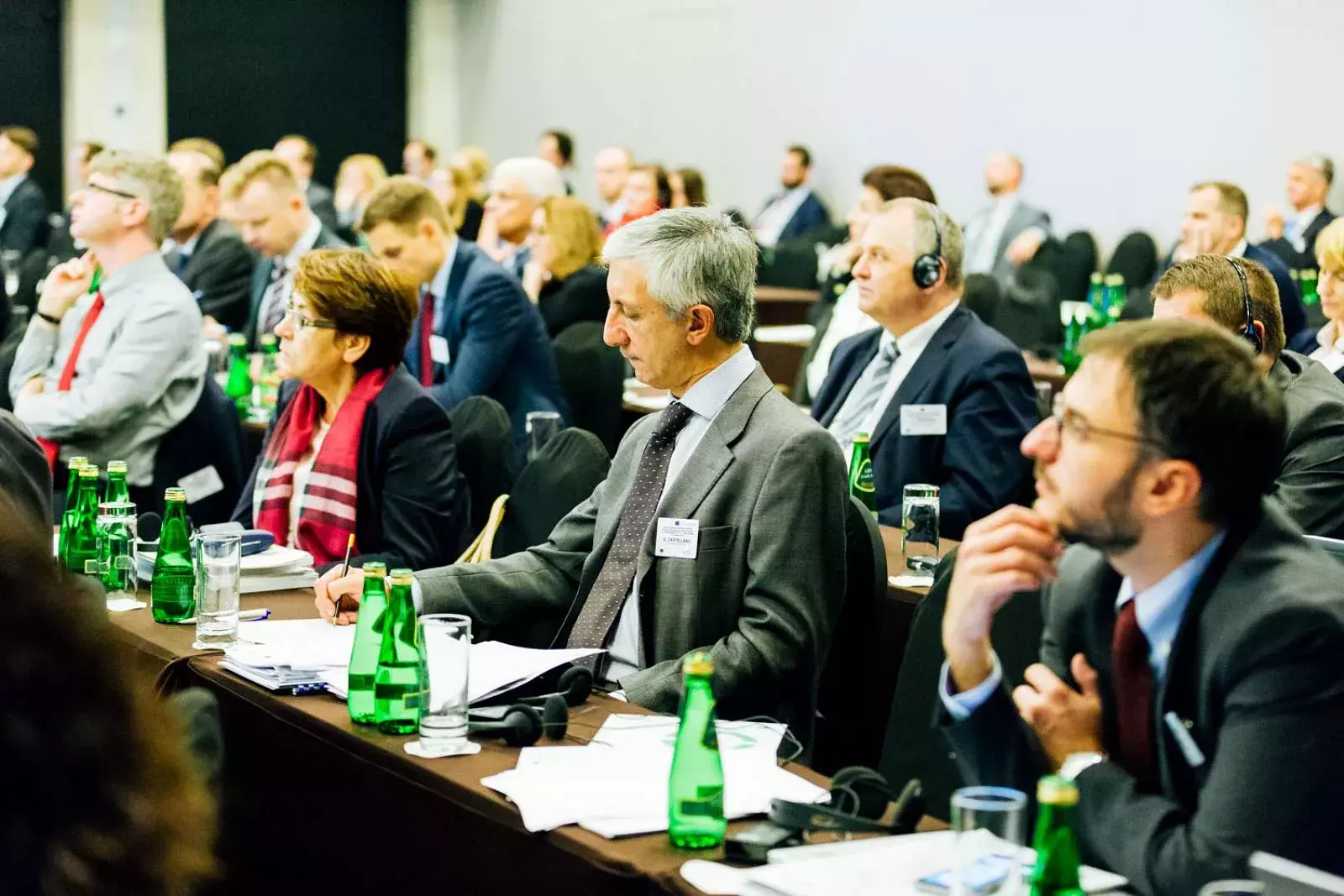 Guido Castellano and participants following presentations