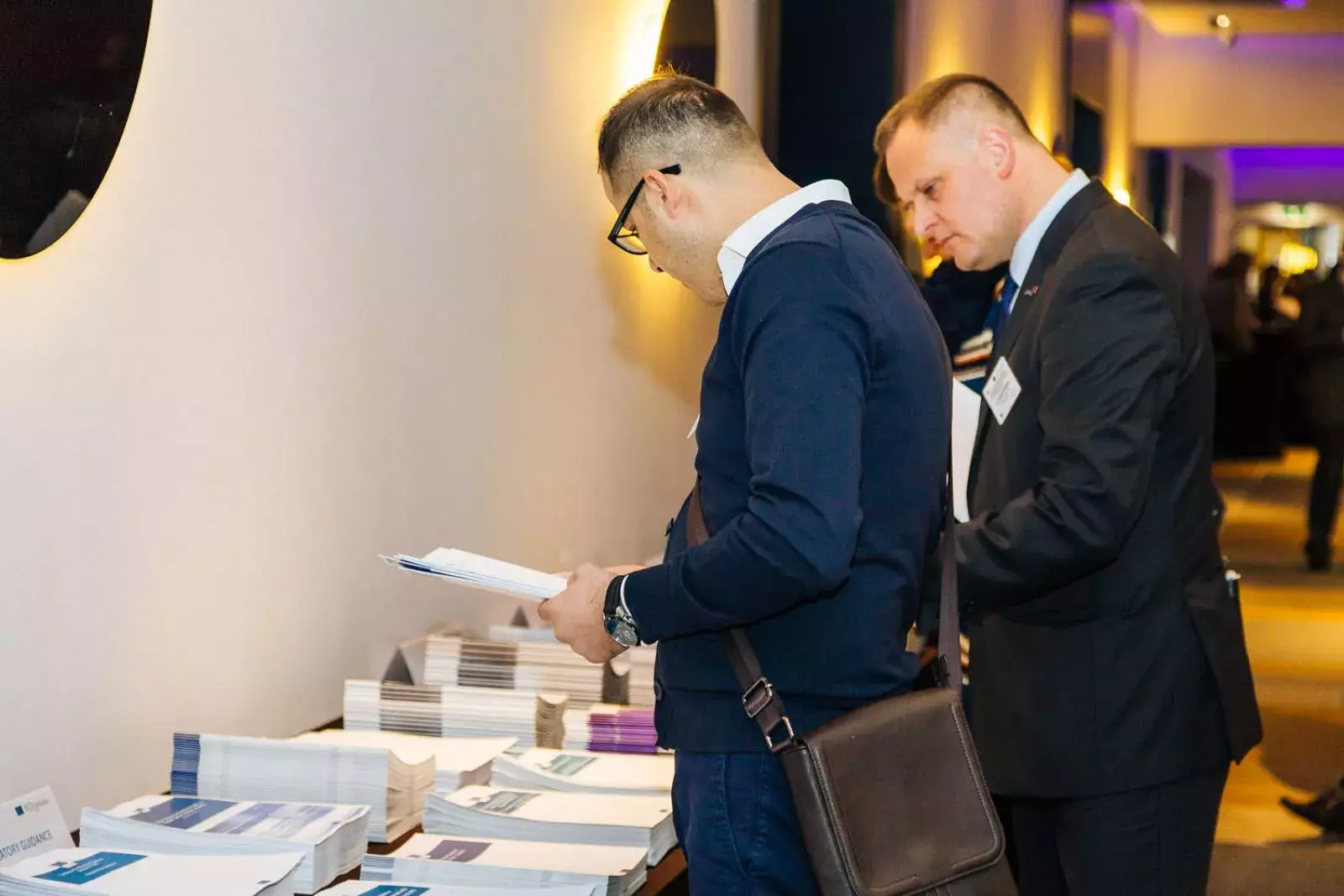 Event participants selecting fi-compass publications