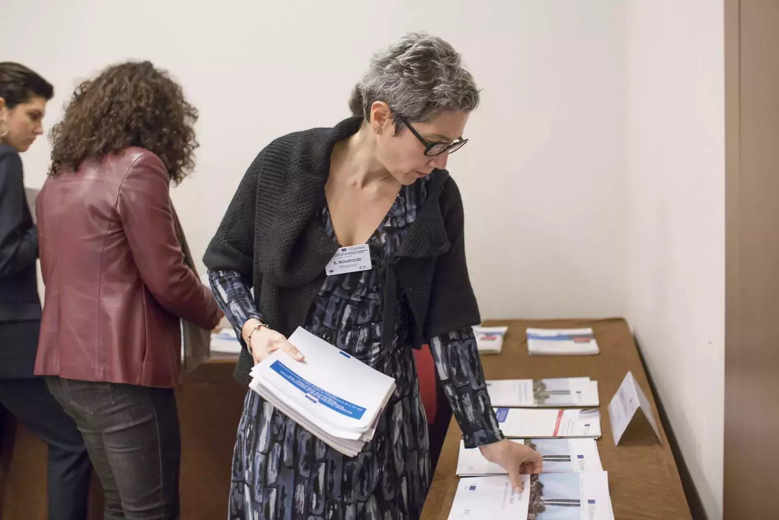 Event participants selecting fi-compass publications