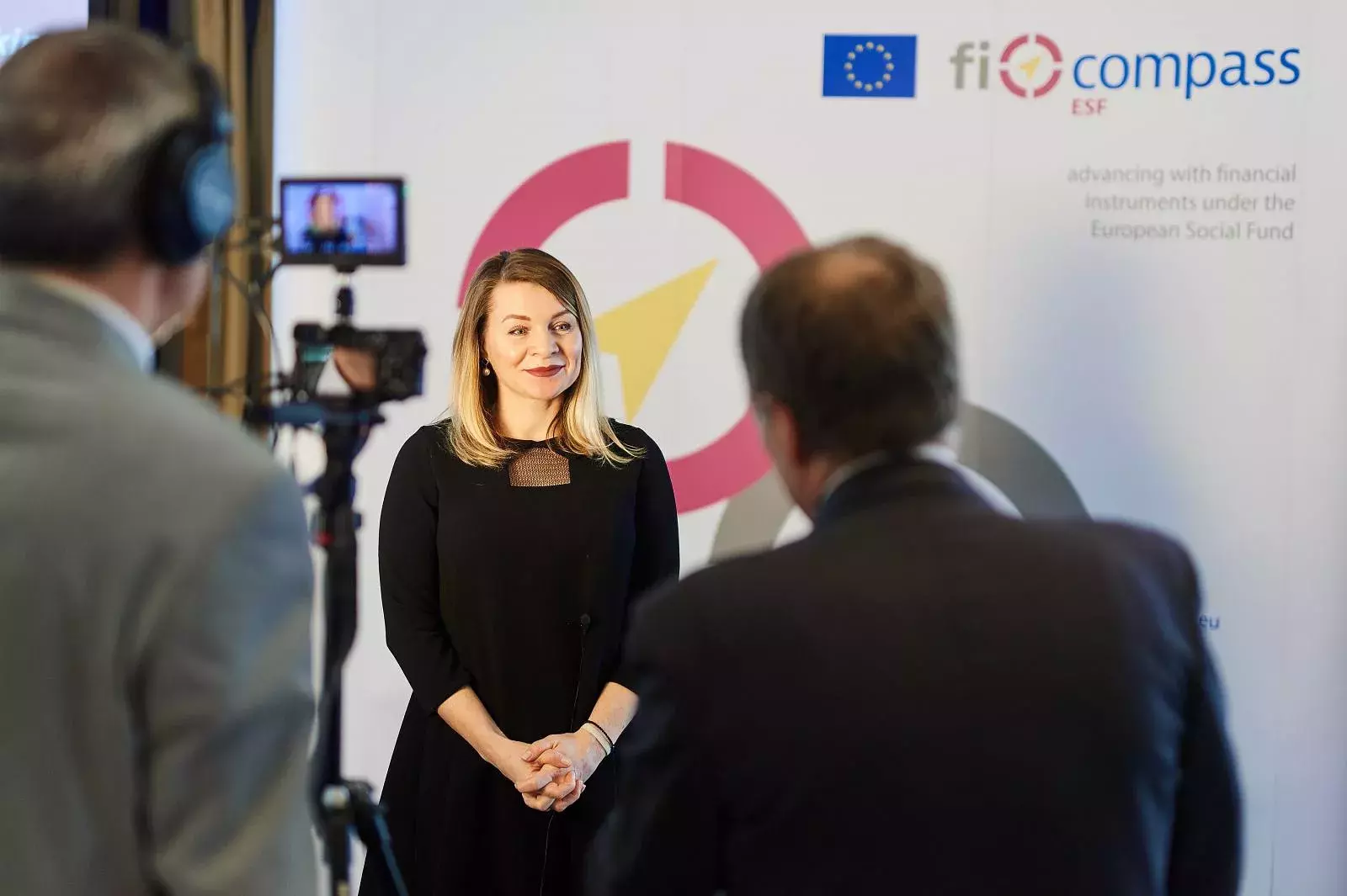 Event participant giving a video testimonial