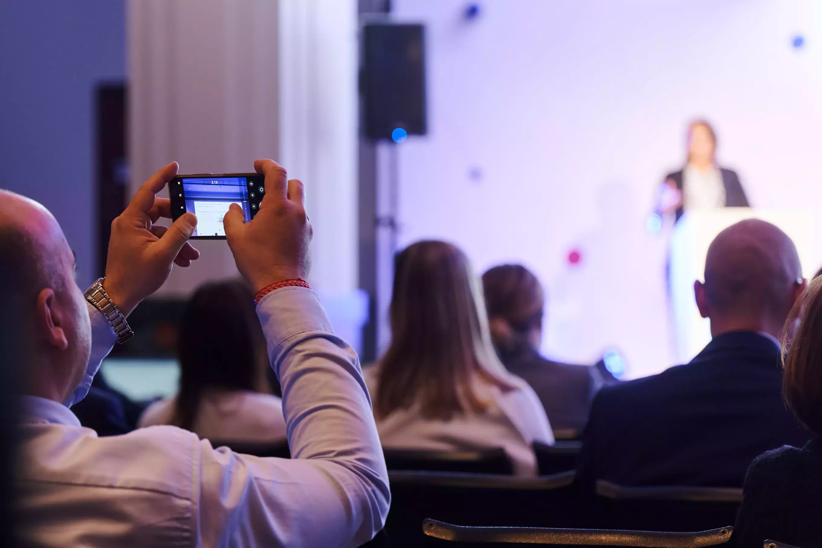 Event participant taking pictures