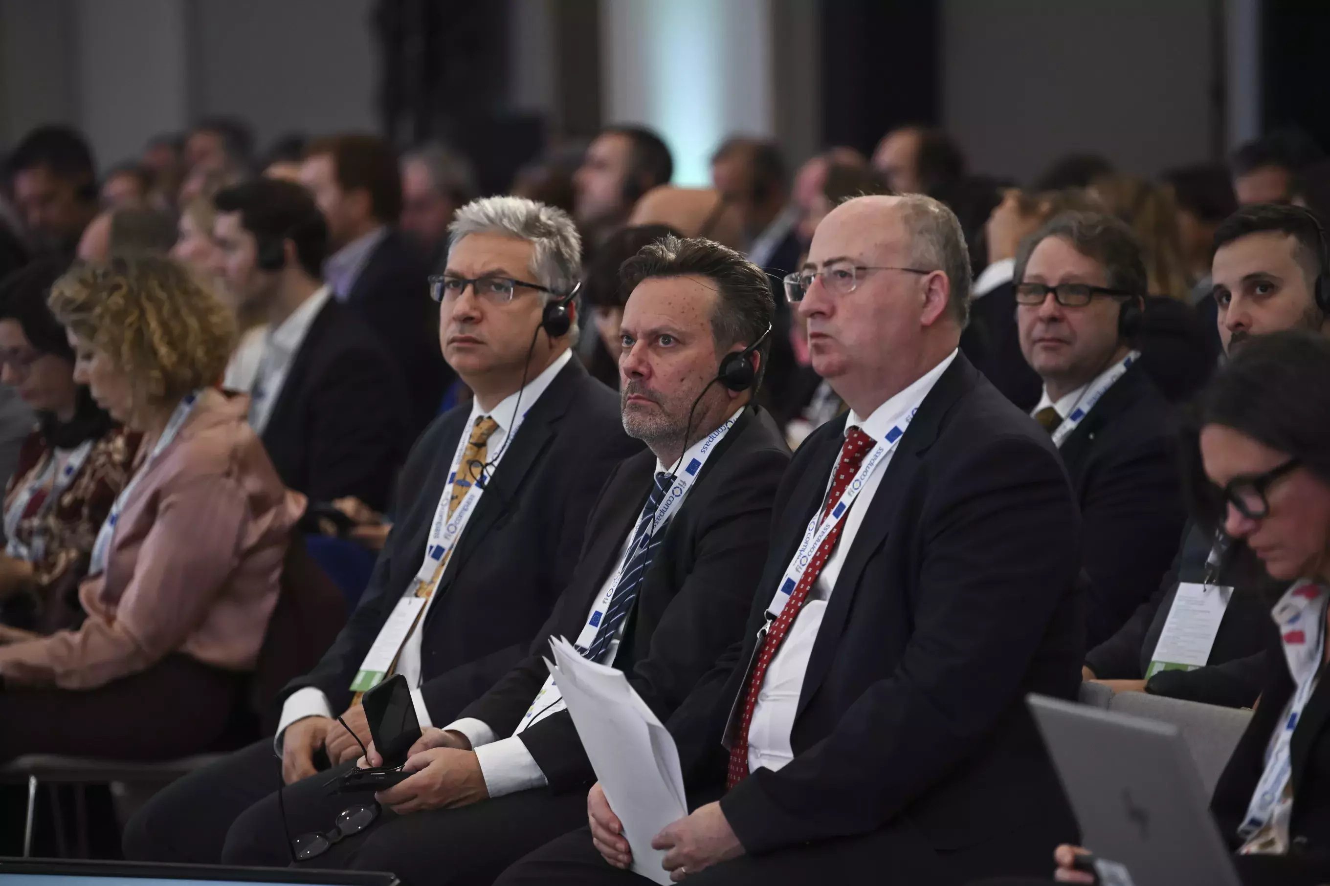 Event participants including speakers