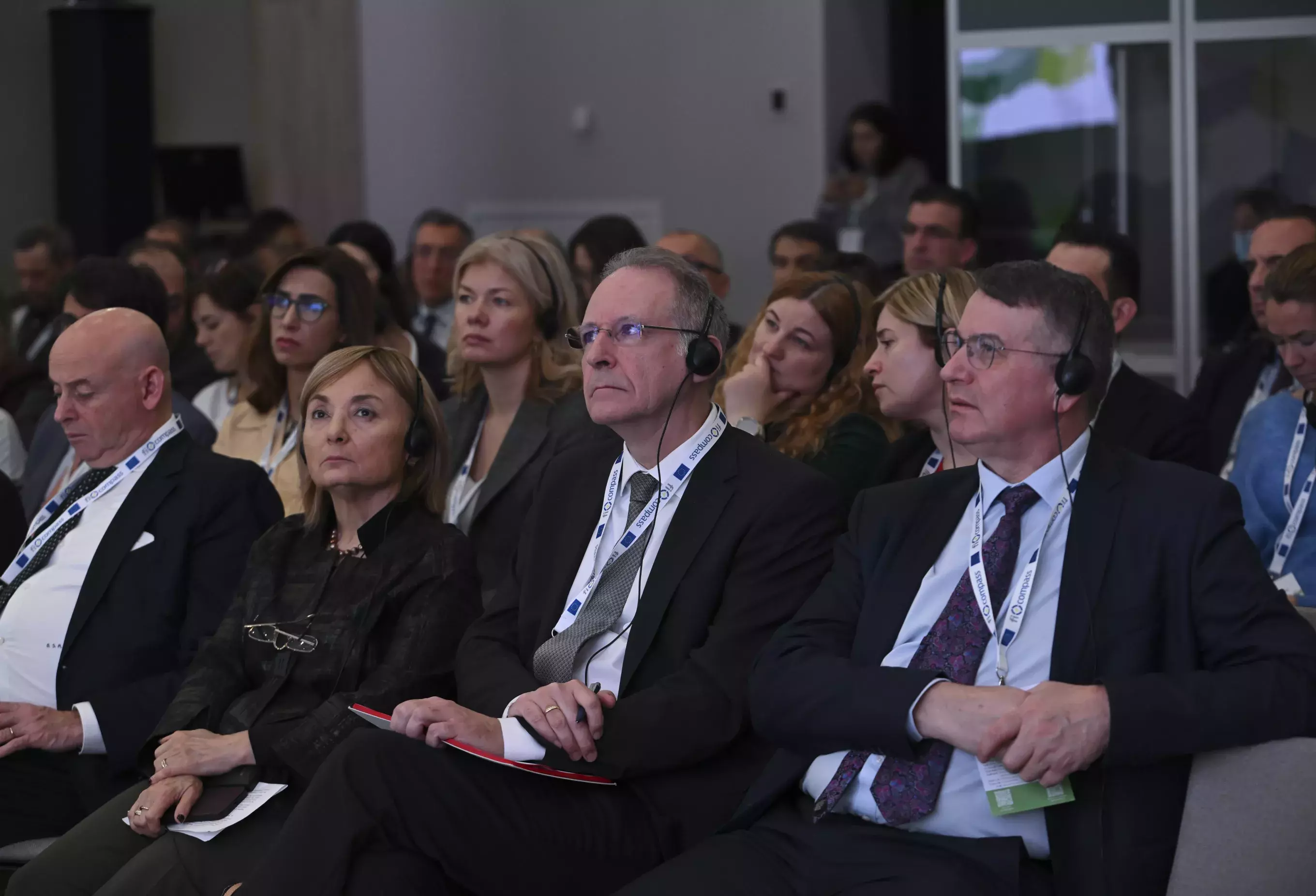 Event participants including speakers