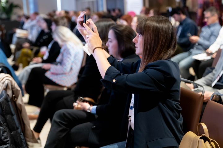 Event participants taking pictures