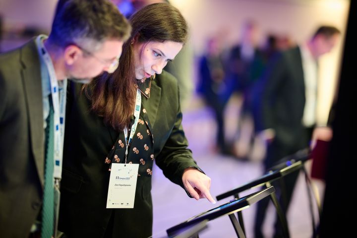 Event participants looking at the showcases