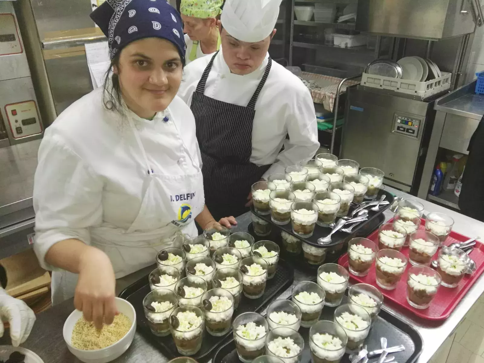 Young adults preparing food for an event Young adults preparing food for an event